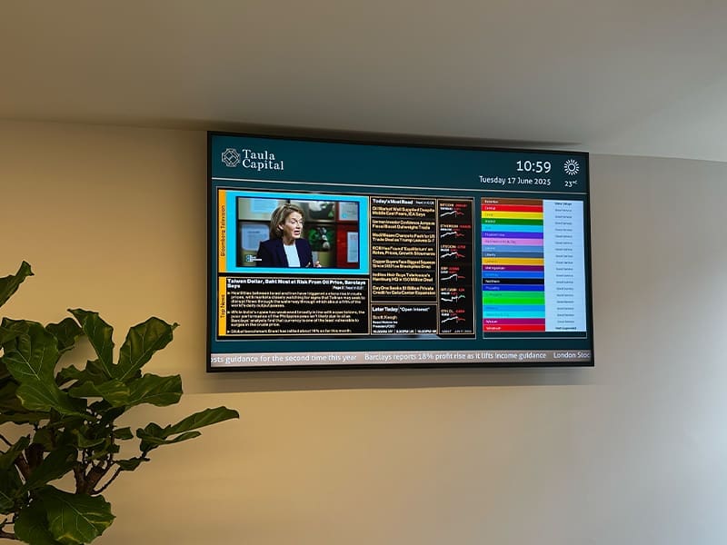 flat screen tv mounted to a wall